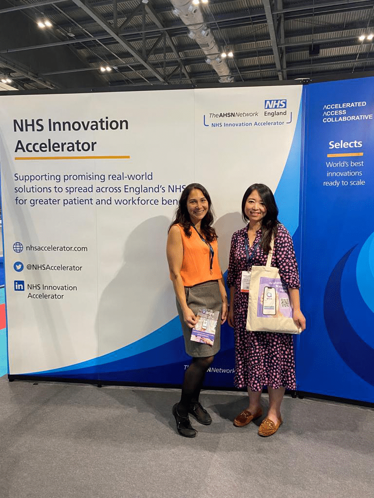 Dr Chen Mao Davies and Mindy Simon at The HETT Show on the NHS Innovation Accelerator stand. 