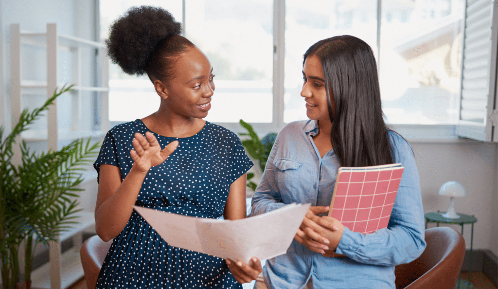 Two HR women talking