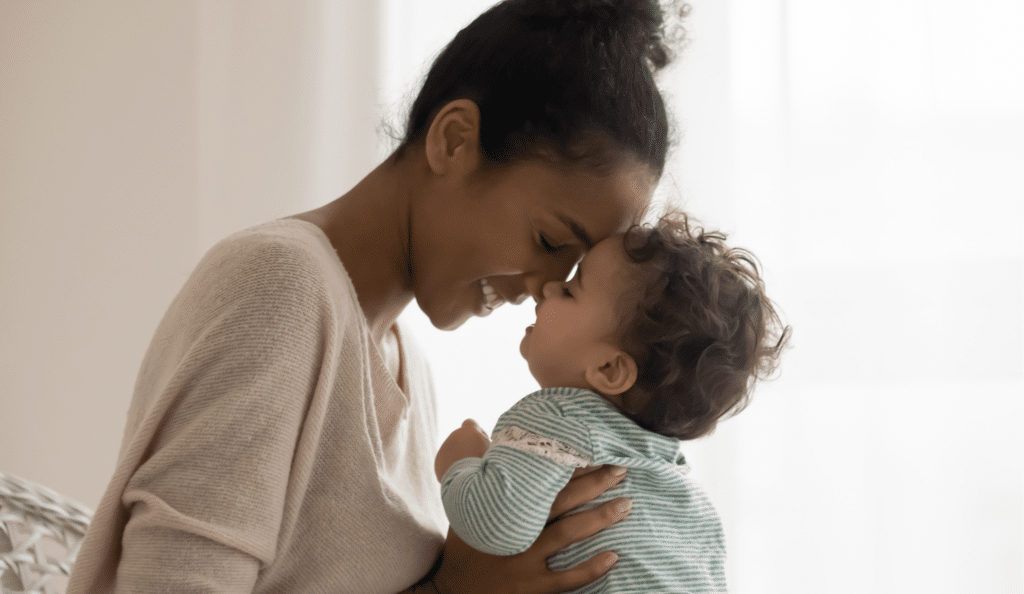 mum and baby touching noses
